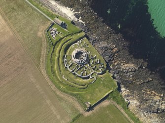Oblique aerial view centred on the Broch of Gurness, taken from the ESE.