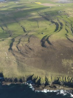 General oblique aerial view of the tabular geology on the lower slopes of Kierfea Hill, Rousay, taken from the N.