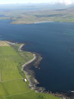 General oblique aerial view centred on Midhowe broch looking across Eynhallow Sound towards Aikerness and the Broch of Gurness, taken from the WNW.