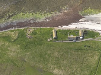 Oblique aerial view centred on the excavations at Castle of Stackel Brae, taken from the NNW.