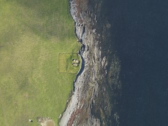 Oblique aerial view centred on the Knap of Howar neolithic settlement, taken from the NNE.