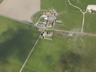 Oblique aerial view centred on Noltland Castle, taken from the SSE.