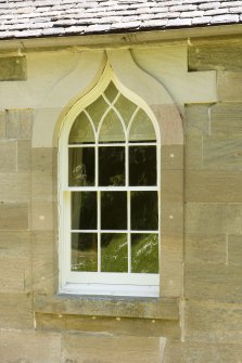 Detail of ogee arched window on W face