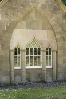 Detail of triple ogee arched window on N face