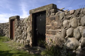 General view of garden wall showing entrances.