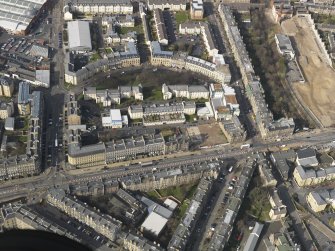 Oblique aerial view centred on Leith Walk, taken from the SE.