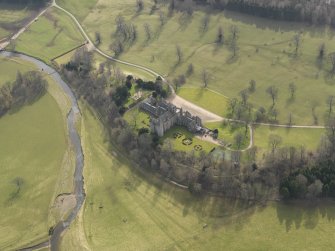 Oblique aerial view centred on the castle, taken from the  N.