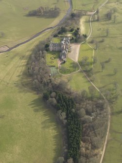 Oblique aerial view centred on the castle, taken from the  NNW.