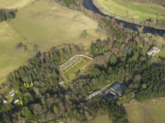 Oblique aerial view centred on the walled garden with the country house adjacent, taken from the SW.
