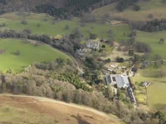 General oblique aerial view centred on the country house, taken from the WNW.