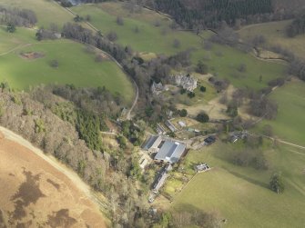 General oblique aerial view centred on the country house, taken from the W.