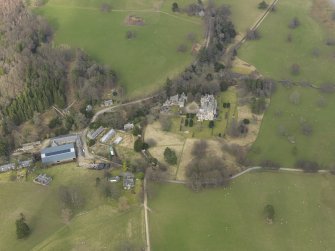 General oblique aerial view centred on the country house, taken from the S.