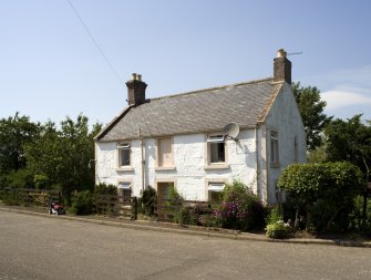 House adjacent to bridge, view from SE