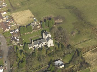 Oblique aerial view centred on the Preceptory and parish church, taken from the SSW.