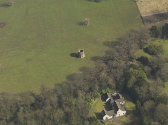 Oblique aerial view centred on the dovecot, taken from the W.
