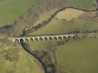 Oblique aerial view centred on the viaduct, taken from the SW.