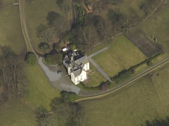 Oblique aerial view centred on the country house, taken from the SSW.