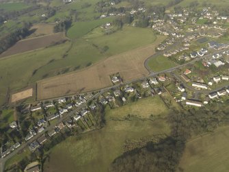 General oblique aerial view centred on the village, taken from the SSW.