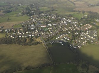 General oblique aerial view centred on the village, taken from the S.