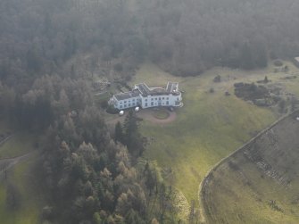 Oblique aerial view centred on the house, taken from the NE.