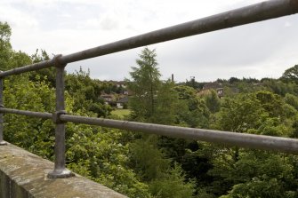 Detail of handrail on parapet showing Lady Victoria colliery headstock in the distance.