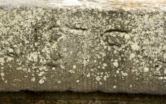Detail of possible inscribed date on N parapet.