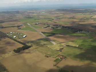 General oblique aerial view of East Fortune Airfield, taken from the SE.