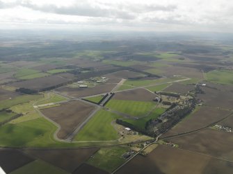 General oblique aerial view of East Fortune Airfield, taken from the ENE.