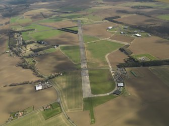 General oblique aerial view of East Fortune Airfield, taken from the WNW.