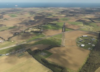 General oblique aerial view of East Fortune Airfield, taken from the WSW.