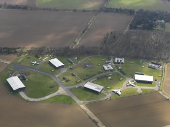 Oblique aerial view of East Fortune Airfield technical area, taken from the NNW.