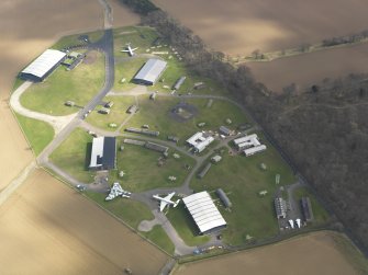 Oblique aerial view of East Fortune Airfield technical area, taken from the WNW.