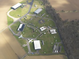 Oblique aerial view of East Fortune Airfield technical area, taken from the W.