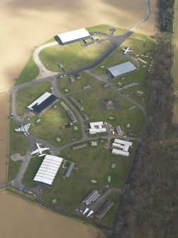 Oblique aerial view of East Fortune Airfield technical area, taken from the WSW.