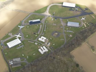 Oblique aerial view of East Fortune Airfield technical area, taken from the SW.