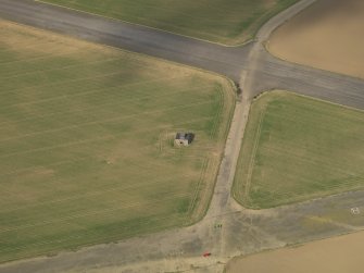 Oblique aerial view of East Fortune Airfield control tower, taken from the SSE.