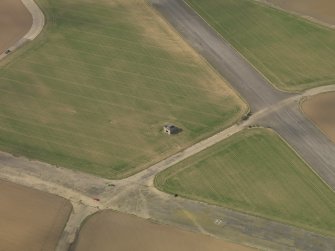 Oblique aerial view of East Fortune Airfield control tower, taken from the ESE.