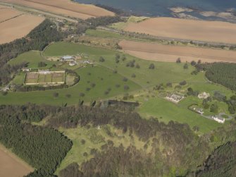General oblique aerial view of Dunglass House and policies, taken from the SSW.
