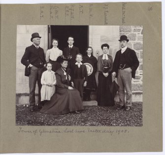View of family group at entrance. .
Inscribed: 'Tower of Glenstrae. Loch Awe. Castle day 1905'.

