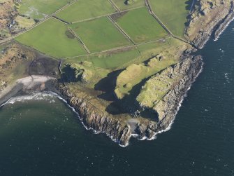 General oblique aerial view centred on the remains of the forts, Dunagoil, Bute, with the remains of the rig and furrow adjacent, taken from the W.