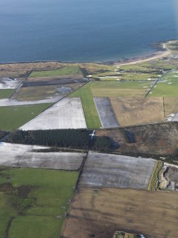 General oblique view looking towards Stravannan Bay looking along Bute airfield, taken from the E.