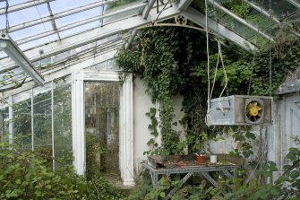 Interior. E range, view showing doorway to melon pit