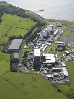 Oblique aerial view centred on the power stations, taken from the NE.