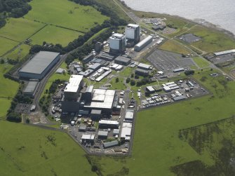 Oblique aerial view centred on the power stations, taken from the NNE.