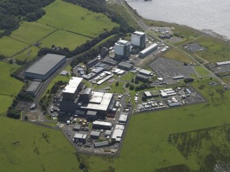 Oblique aerial view centred on the power stations, taken from the NNE.