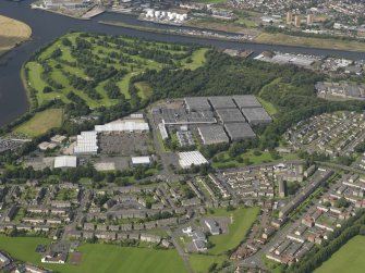 General oblique aerial view of Blytheswood Retail Park and Renfrew Golf Course, taken from the SSW.