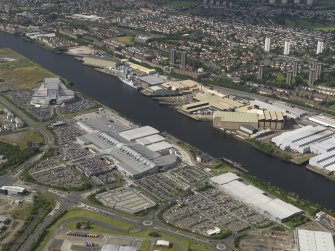 Oblique aerial view of the Braehead Retail Park with the Elderslie Shipyard beyond, taken from the SSE.