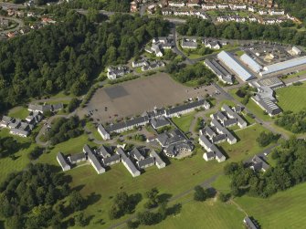 General oblique aerial view of Dreghorn Barracks, taken from the SSW.