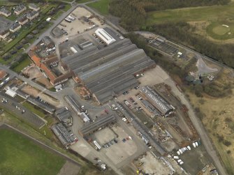 Oblque aerial view centred on the works, taken from the ESE.