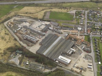 Oblque aerial view centred on the works, taken from the NNW.